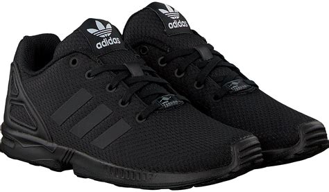 zwarte adidas sneakers|solid black Adidas shoes.